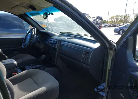 2001 Jeep Grand Cherokee Laredo из США, поврежденный, VIN 1J4GW48N01C587010